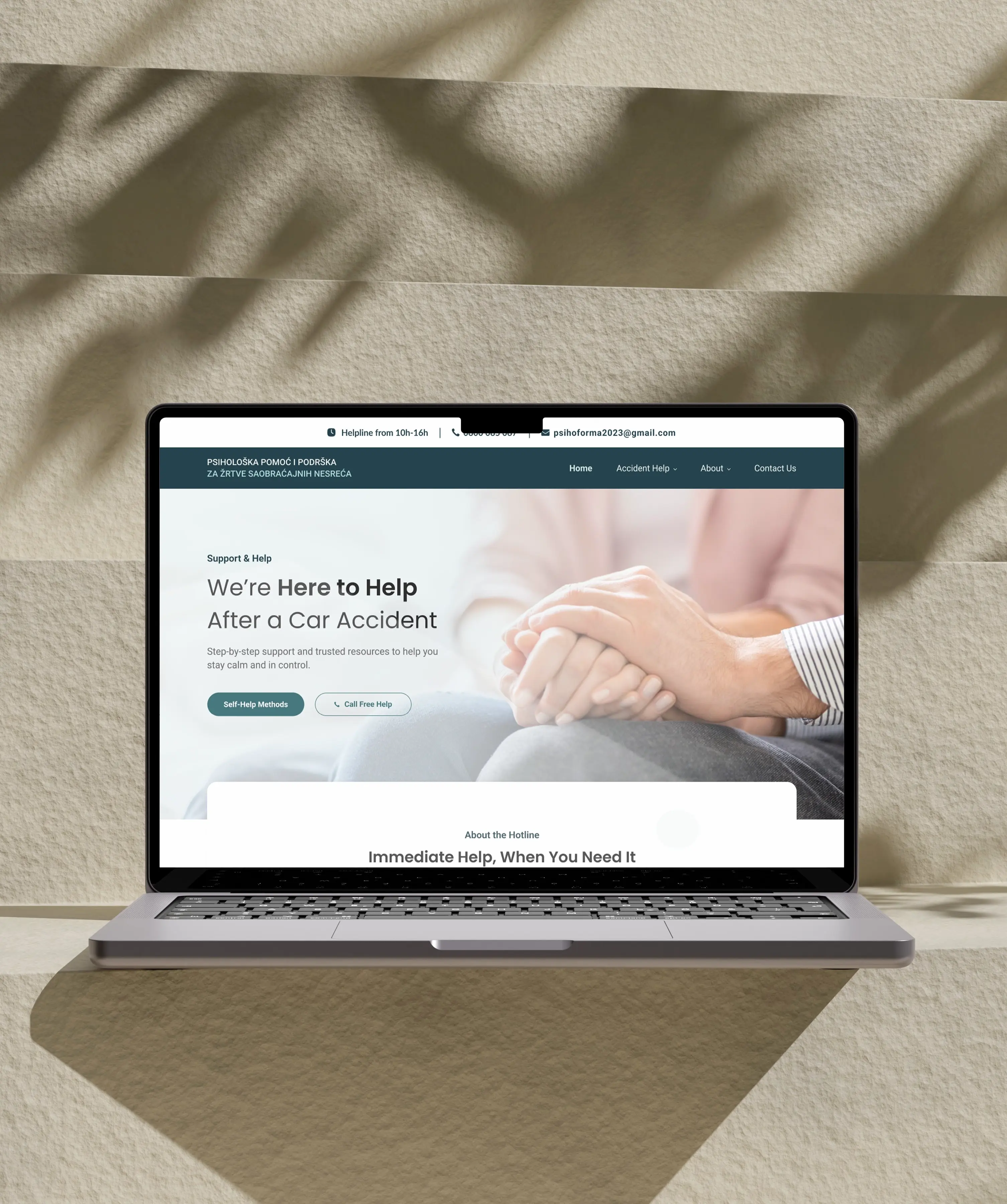 ABS support website displayed on a laptop